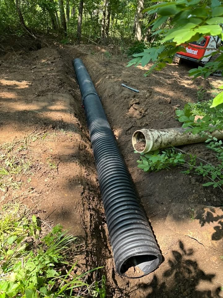 Trenching and drainage pipe excavation near Adrian, MO